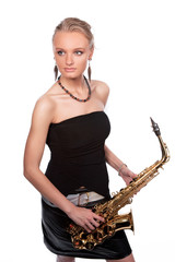 dreaming sensual blonde woman with saxophone isolated