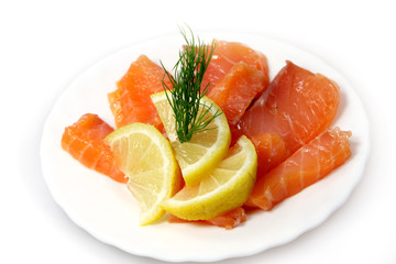 Fillet of  salty salmon  with greens and  lemon