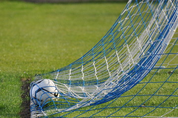 Football in back of the net
