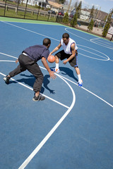 Men Playing Basketball