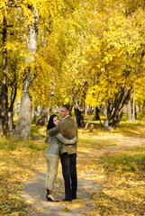Fototapeta premium young couple walking in the park