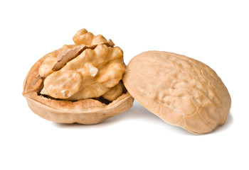 Cracked walnuts isolated on white background