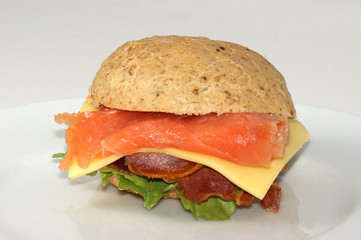 fish burger with salmon and organic salad