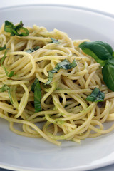 spaghetti with organic home made pesto on a plate