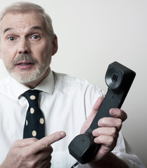 homme d'affaires combiné téléphone