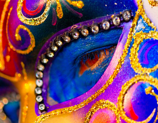 Detail of traditional Venice mask with colorful decoration