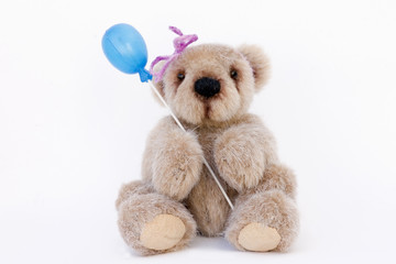 osito de peluche con globo