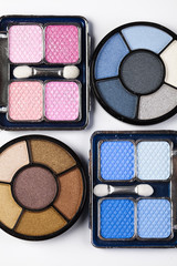 Palette of powder eyeshadows on white background