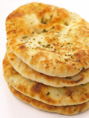 a stack of naans