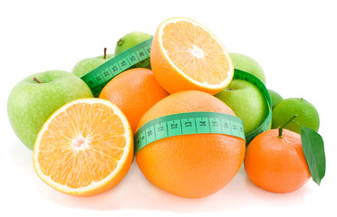 Fototapeta na wymiar Fruit useful to health:apples, oranges, tangerines and limes.
