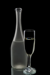 Wine bottle and glass