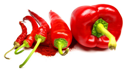 Red peppers with powder isolated on white