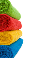 Colorful towels isolated on white background