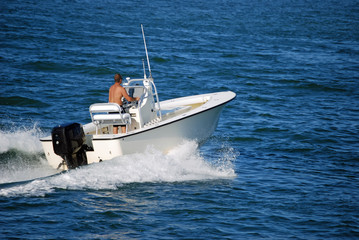 Fototapeta premium Outboard Engine Powered Fishing Boat