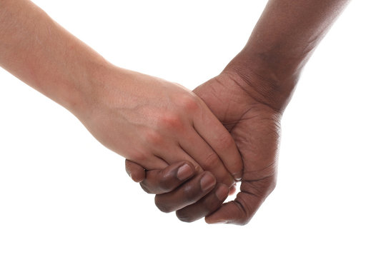 black and white couple holding hands