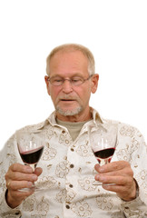 Senior man enjoying wine