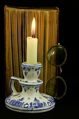 Candle Book and Gl;asses