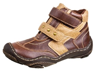 Children's leather boots isolated on white background