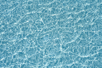 Blue pool water transparent texture reflexion