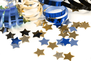 Stars in the form of confetti with streamers on white