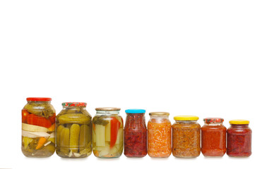 Glass jars with tinned vegetables isolated