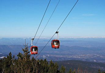 Cable car ski lift over mountain landscape