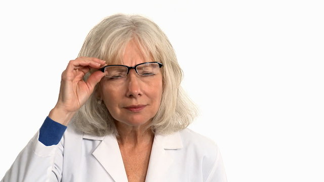 senior woman trying out glasses