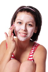 young woman with beauty mask