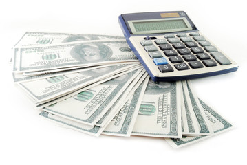 Fototapeta premium Heap of dollars and calculator