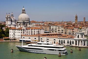 Naklejka premium Massive White Yacht by Venice Church