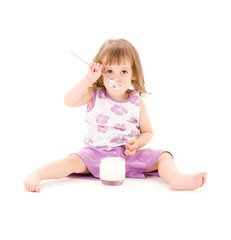 little girl with yogurt