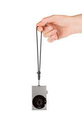 Hand and photo camera isolated on white background