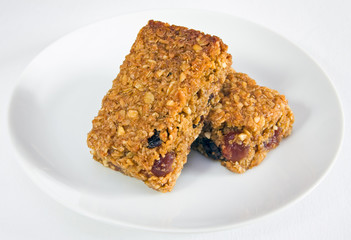 Two flapjacks stacked together on a plate