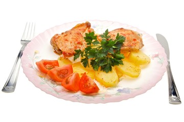 Baked chicken and potatoes  isolated on white