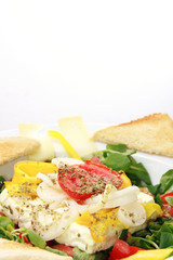 baked feta cheese on lambs lettuce