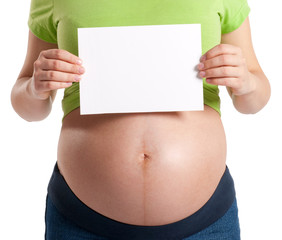 Pregnant woman with blank paper