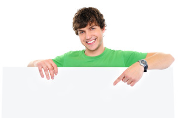 happy man under blank banner and showing on it
