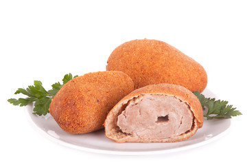 Cutlet on plate with parsley