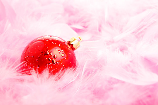 Red Christmas Ball On Pink Fluff