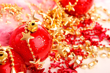 Three red christmas balls on stars isolated