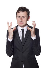 angry businessman in a black suit