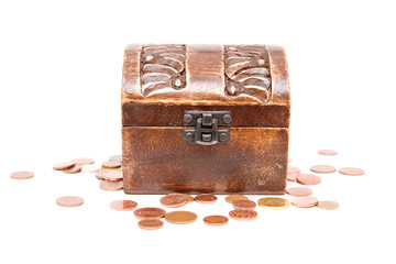 A wooden ancient chest full of money..