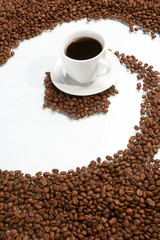 Cup with coffee, costing on coffee grain