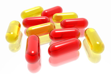 red and yellow pills on white background