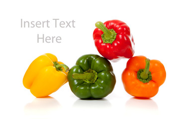 Multicolored peppers on a white background