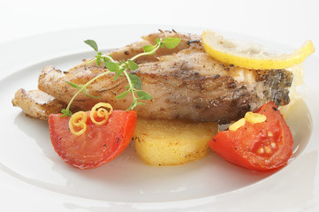 grilled carp fillet with potato and vegetable