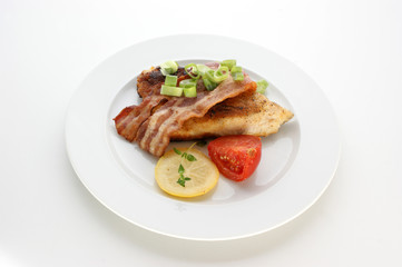 Obraz na płótnie Canvas grilled carp fillet with potato and vegetable