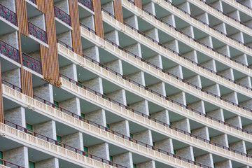 Wall of modern apartment building close up