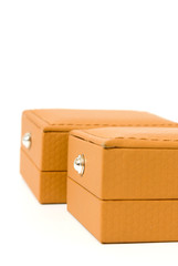 two brown boxes for jewelry