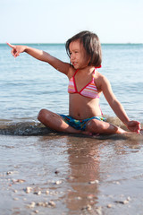 little girl in the beach